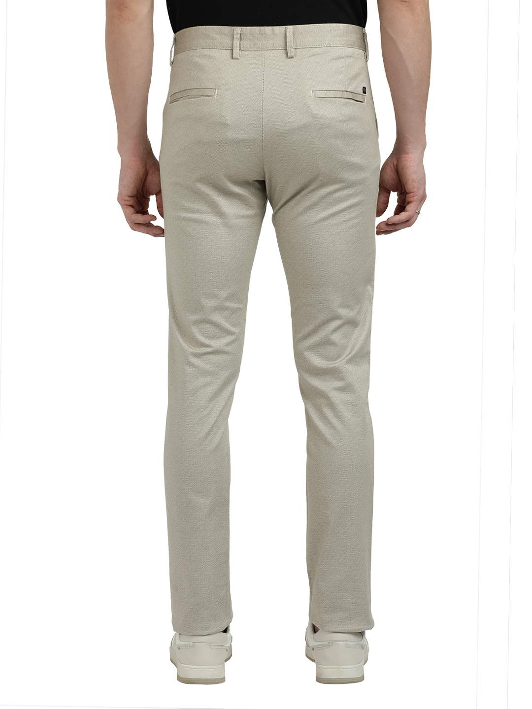 Model wearing Clarke Gable's Beige Custom Fit Trousers in a casual setting