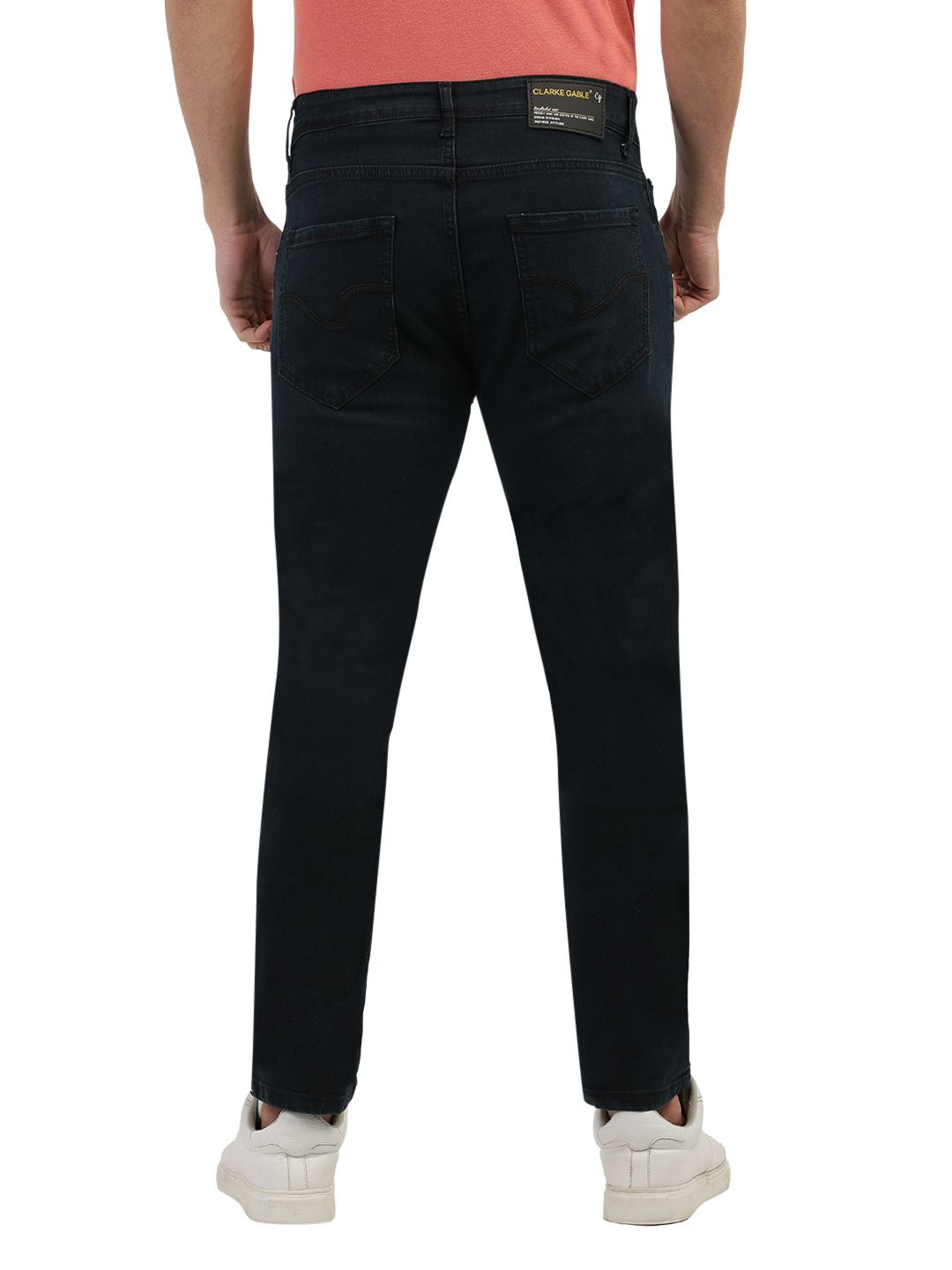 Model wearing Clarke Gable's Green Tinted Black Slim Fit Jeans in a casual setting