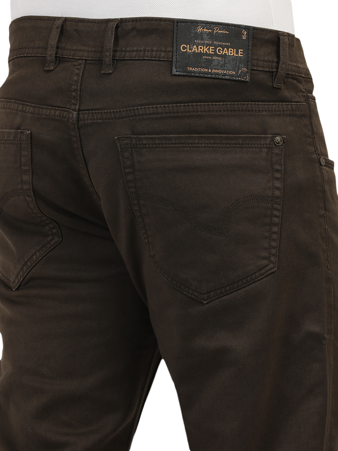 Model wearing Clarke Gable's Coolmax Coffee Skinny Fit Jeans in a casual setting