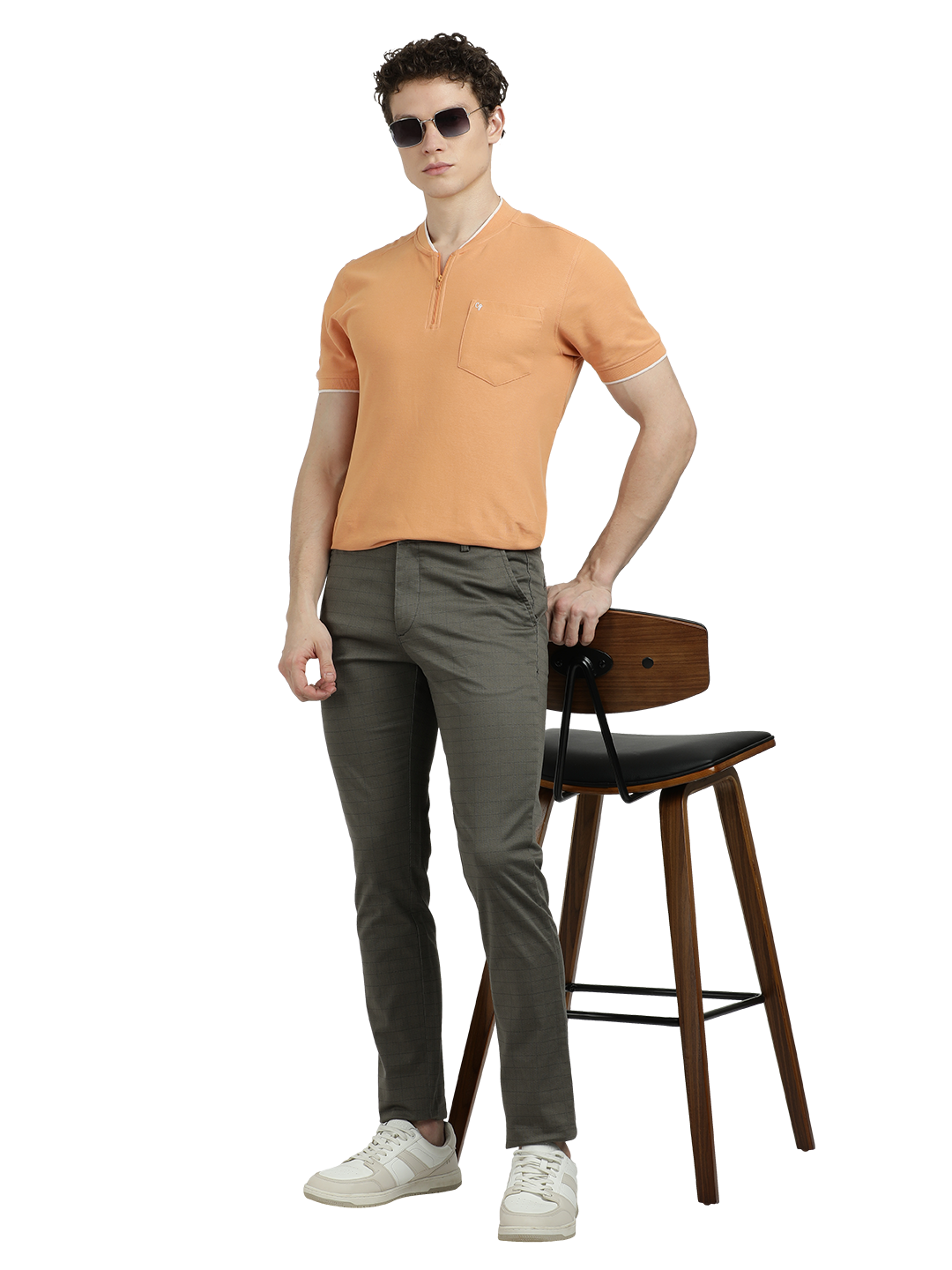 Model wearing Clarke Gable's Dark Olive Custom Fit Trousers in a casual setting