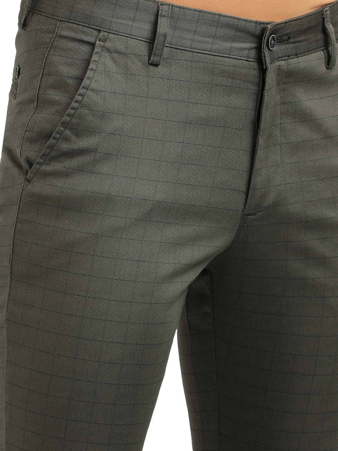 Model wearing Clarke Gable's Dark Olive Custom Fit Trousers in a casual setting