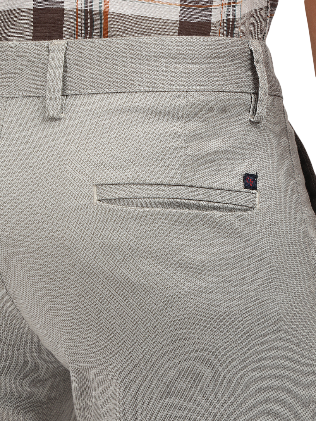 Model wearing Clarke Gable's Light Grey Custom Fit Trousers in a casual setting