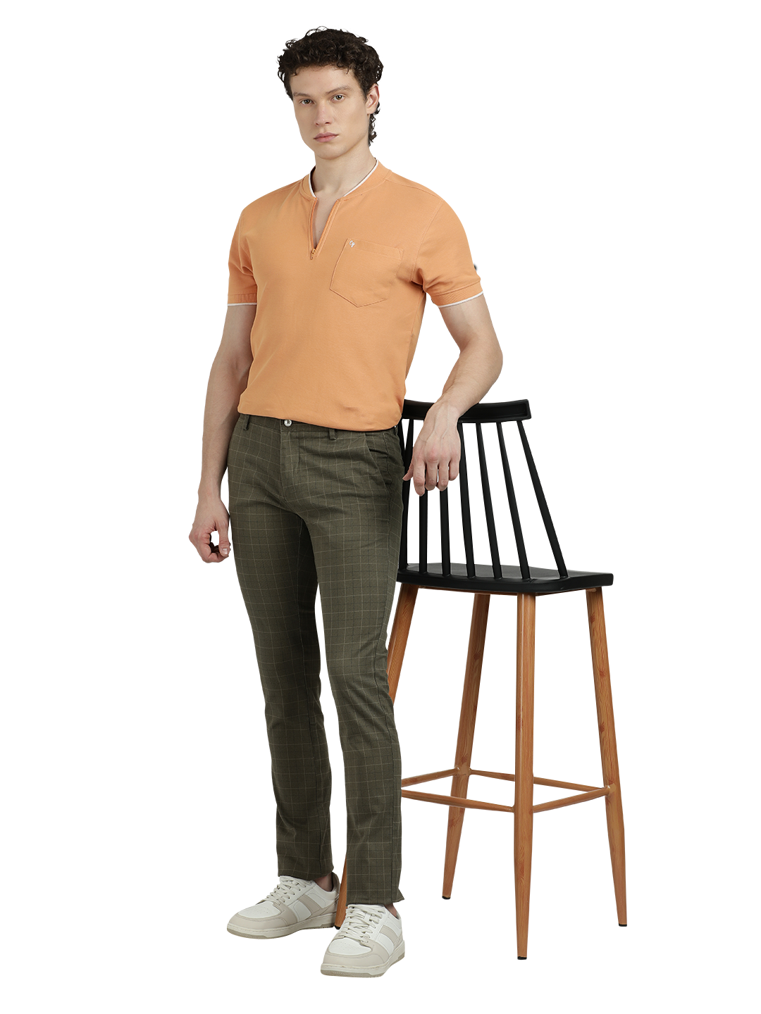 Model wearing Clarke Gable's Light Olive Trim Fit Trousers in a casual setting