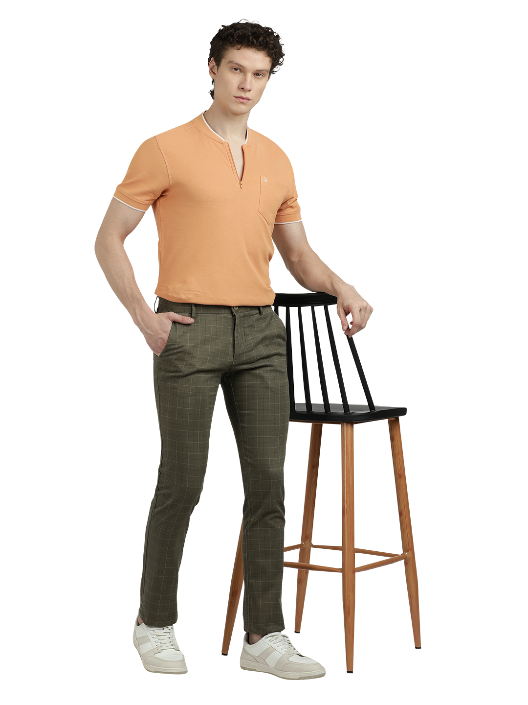 Model wearing Clarke Gable's Light Olive Trim Fit Trousers in a casual setting