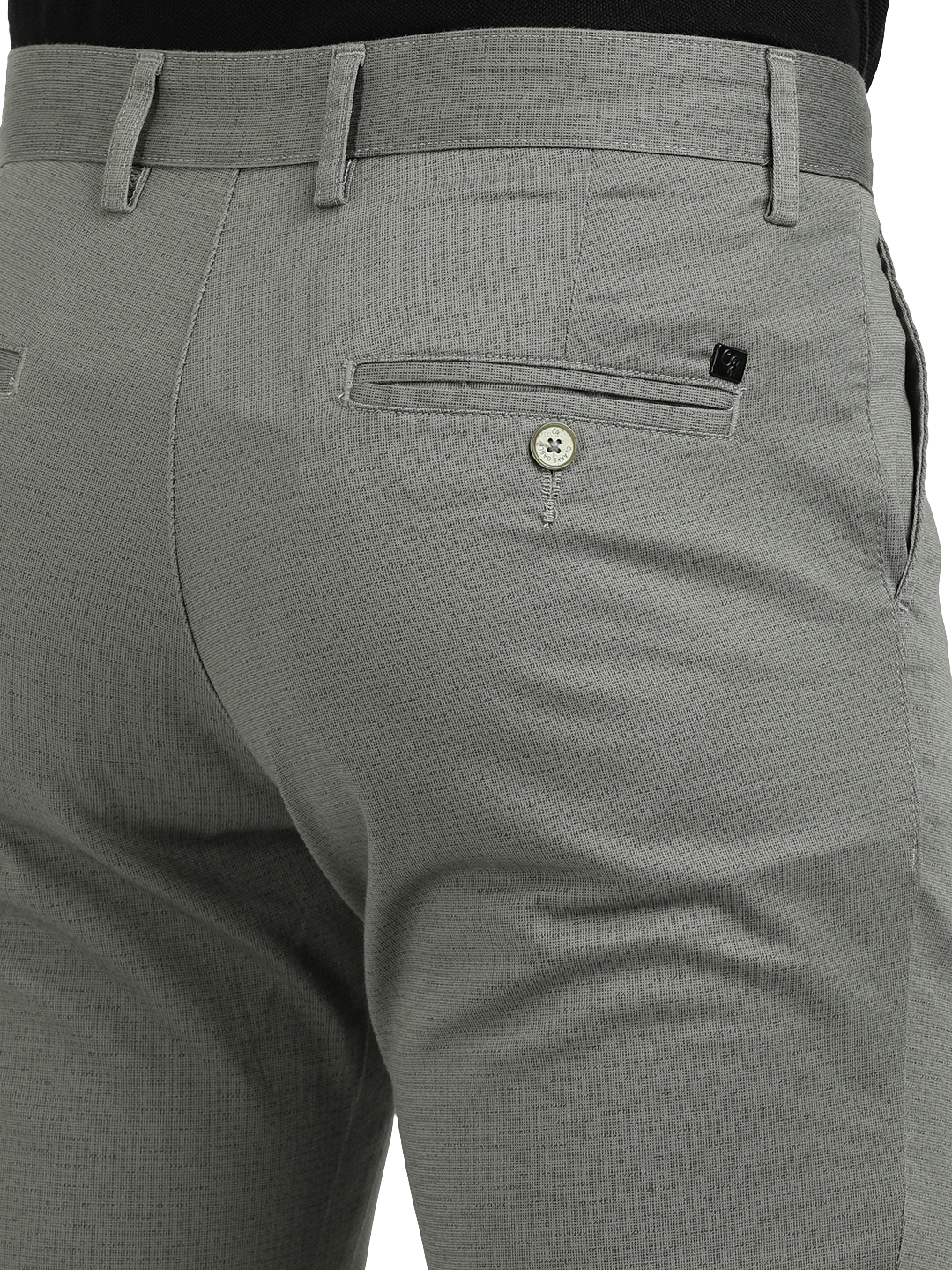 Model wearing Clarke Gable's Light Pista Custom Fit Trousers in a casual setting