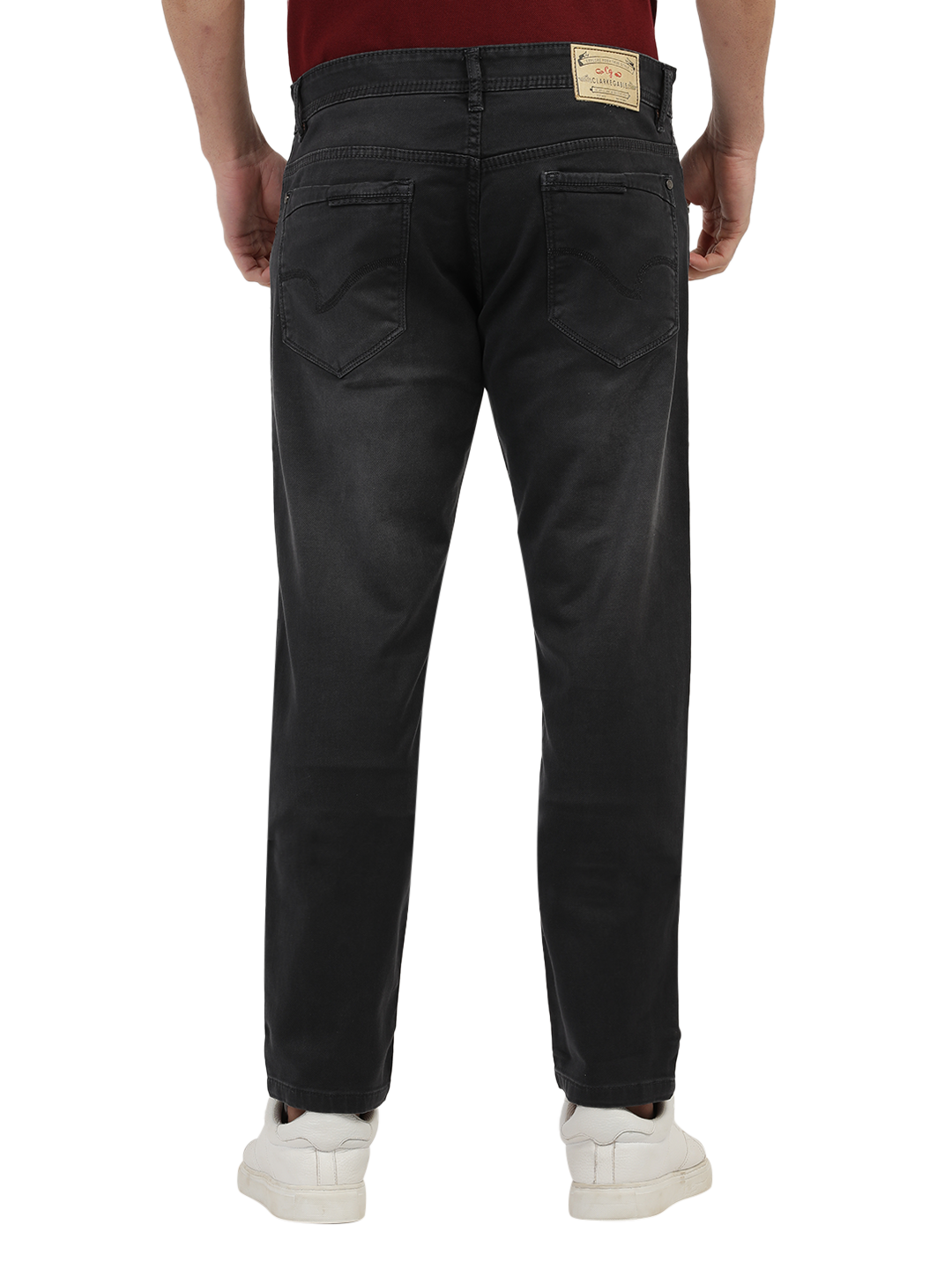 Model wearing Clarke Gable's Marvels Grey Skinny Fit Jeans in a casual setting