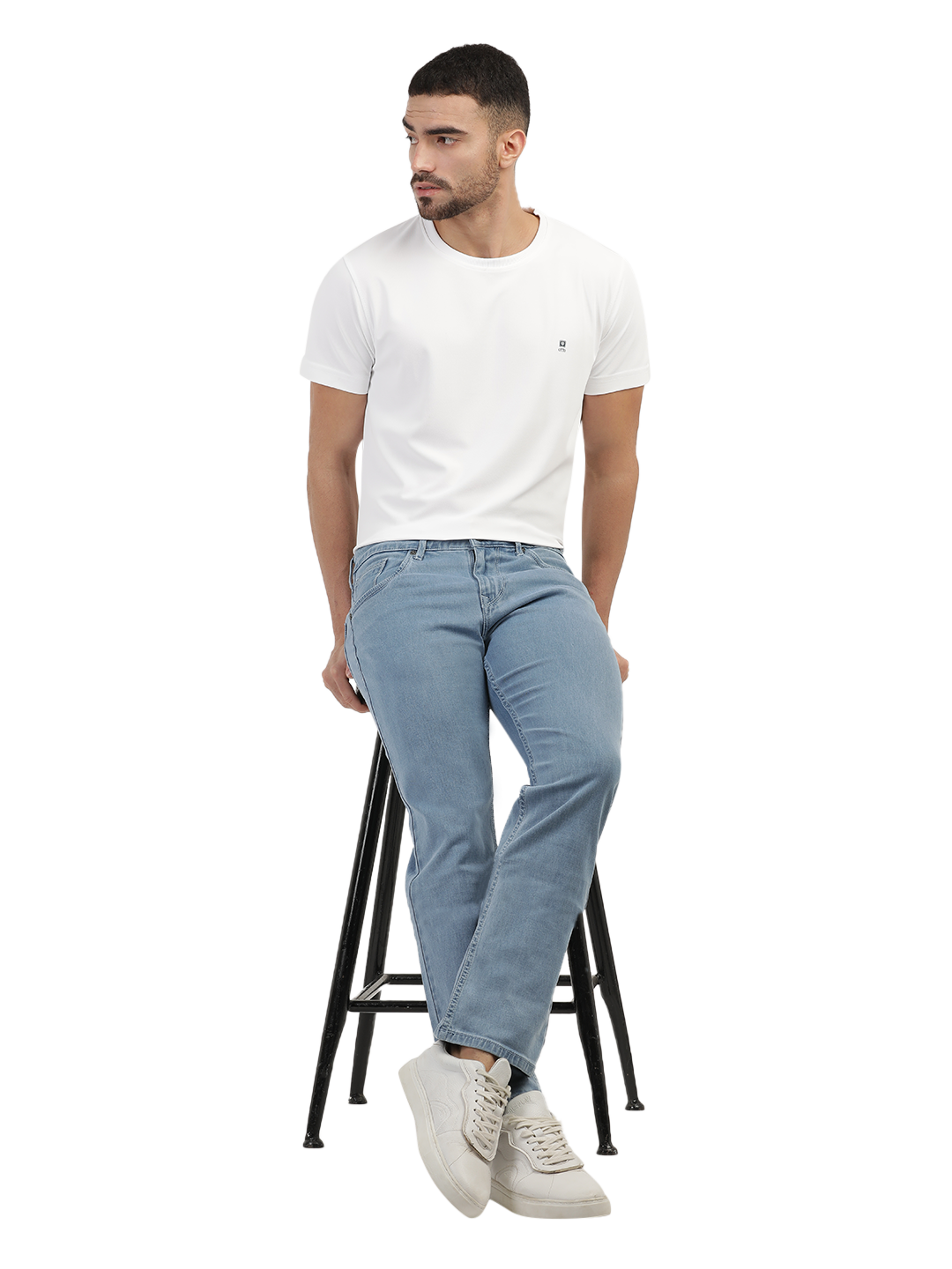 Model wearing Clarke Gable's Polor Ice Blue Smart Fit Jeans in a casual setting