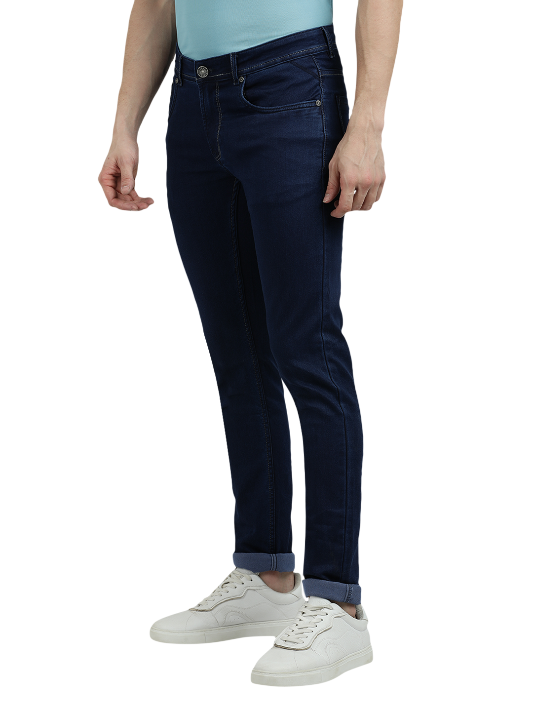 Model wearing Clarke Gable's Solid Dark Blue Skinny Fit Jeans in a casual setting