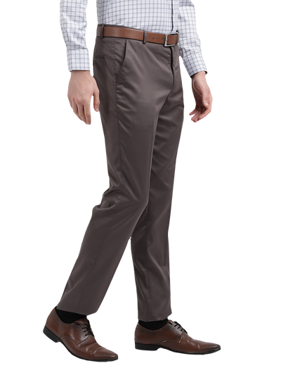 Model wearing Clarke Gable's Grey Sharp Fit Trousers in a casual setting