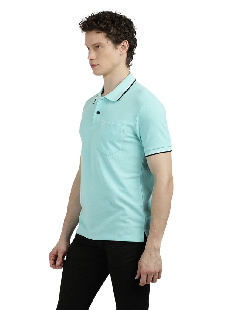 Model wearing Clarke Gable's Aqua Blue Solid Polo Collar T-Shirt in a casual setting