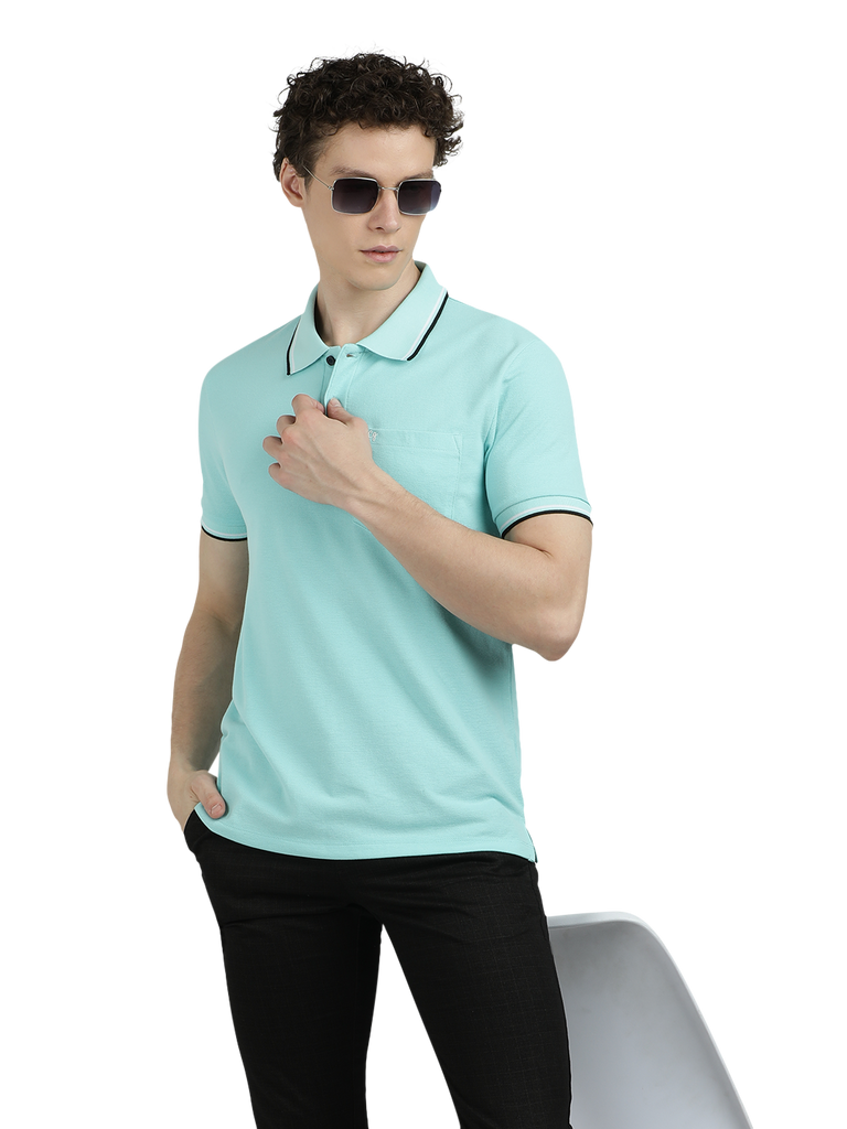 Model wearing Clarke Gable's Aqua Blue Solid Polo Collar T-Shirt in a casual setting