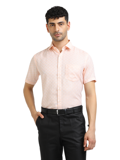 Model wearing Clarke Gable's Baby Pink Printed Formal Shirt in a casual setting
