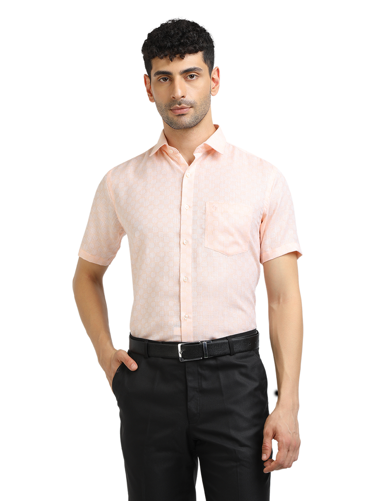 Model wearing Clarke Gable's Baby Pink Printed Formal Shirt in a casual setting