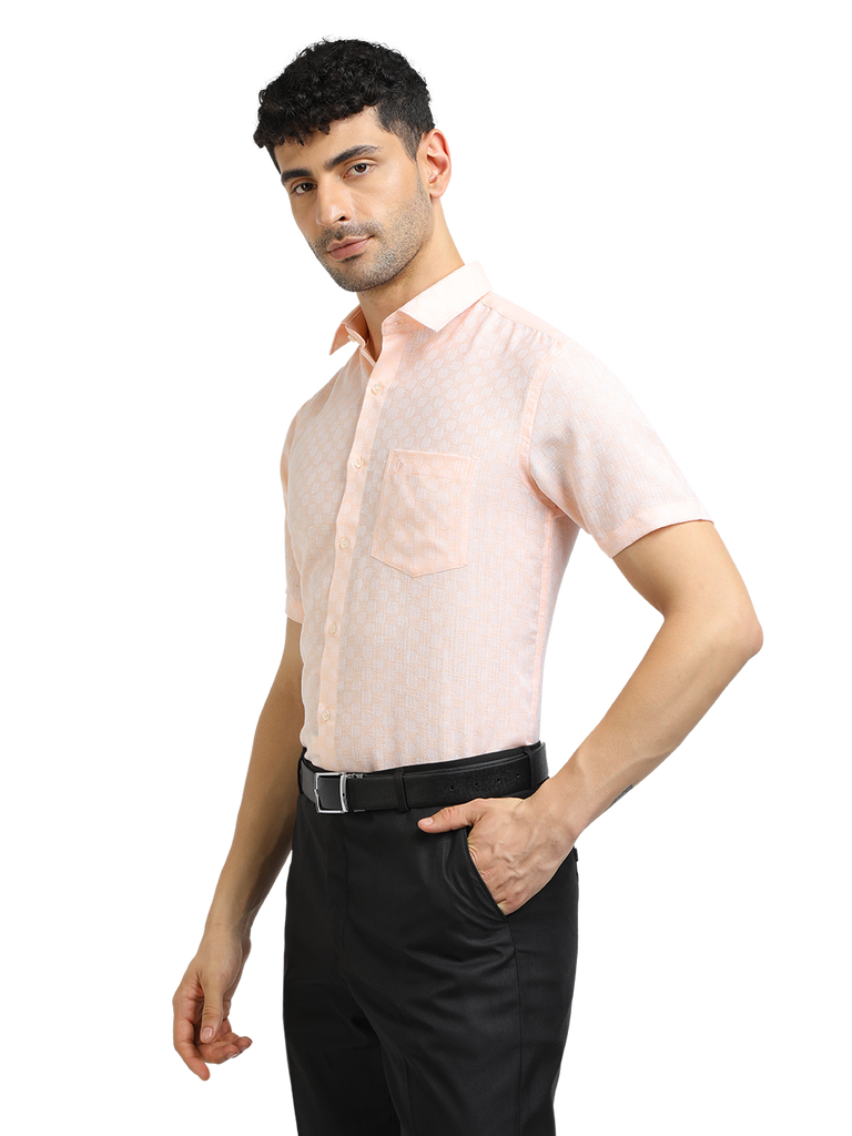 Model wearing Clarke Gable's Baby Pink Printed Formal Shirt in a casual setting