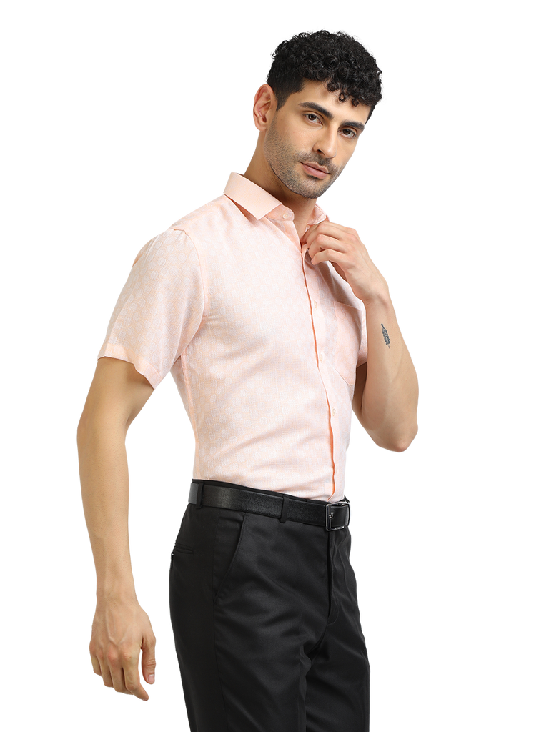 Model wearing Clarke Gable's Baby Pink Printed Formal Shirt in a casual setting