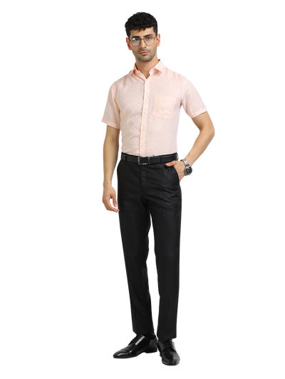 Model wearing Clarke Gable's Baby Pink Printed Formal Shirt in a casual setting