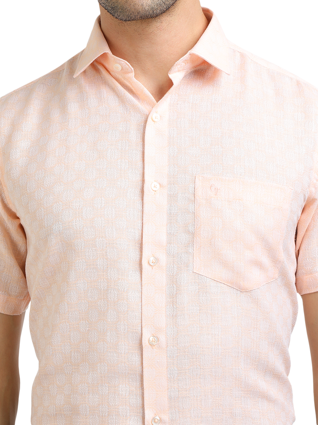 Model wearing Clarke Gable's Baby Pink Printed Formal Shirt in a casual setting