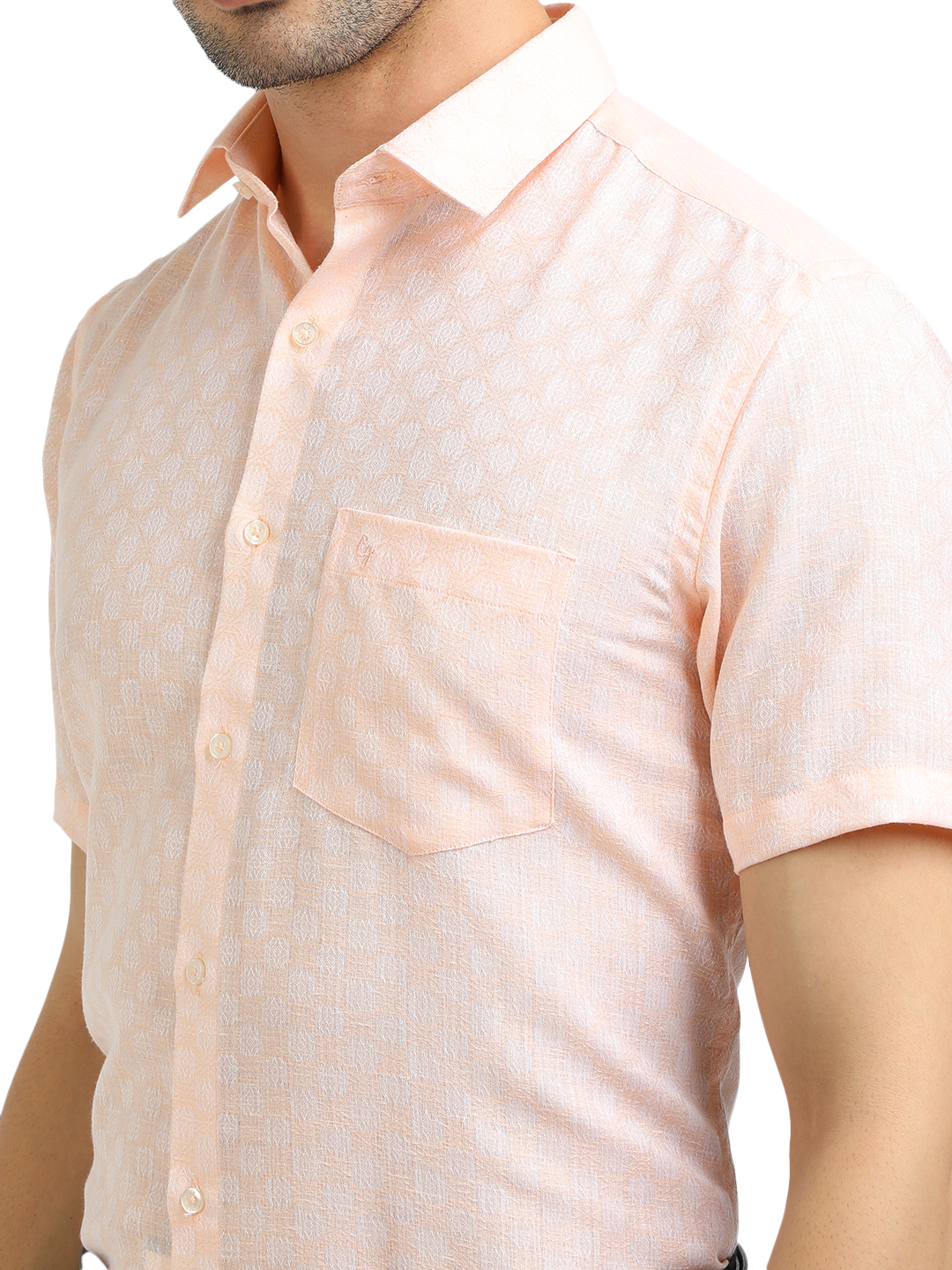 Model wearing Clarke Gable's Baby Pink Printed Formal Shirt in a casual setting