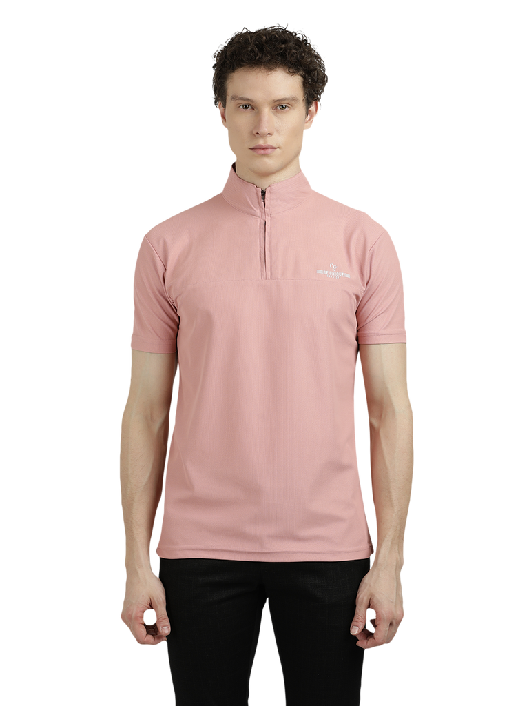 Model wearing Clarke Gable's Baby Pink Solid Turtle Neck T-Shirt in a casual setting