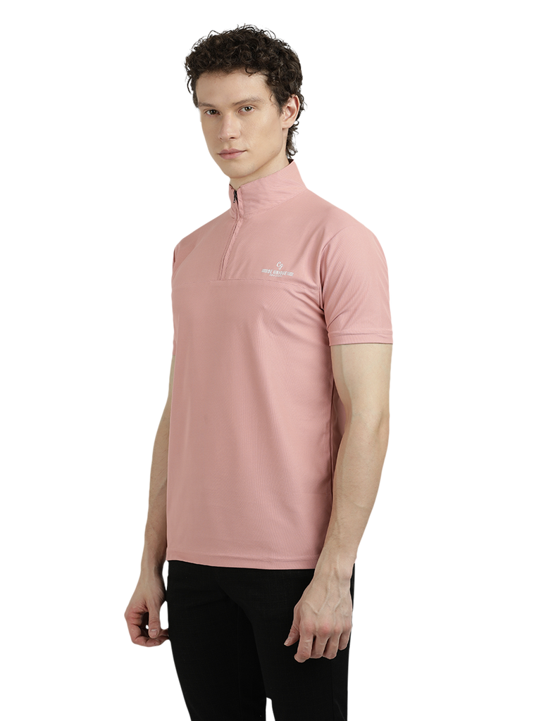 Model wearing Clarke Gable's Baby Pink Solid Turtle Neck T-Shirt in a casual setting