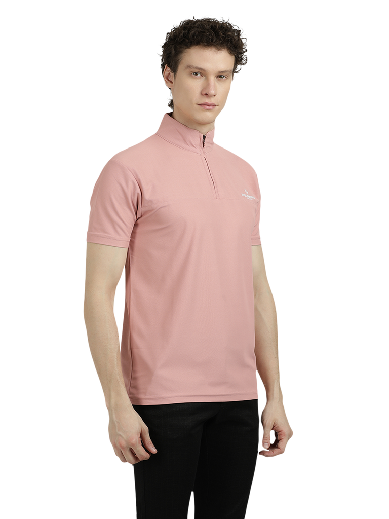 Model wearing Clarke Gable's Baby Pink Solid Turtle Neck T-Shirt in a casual setting