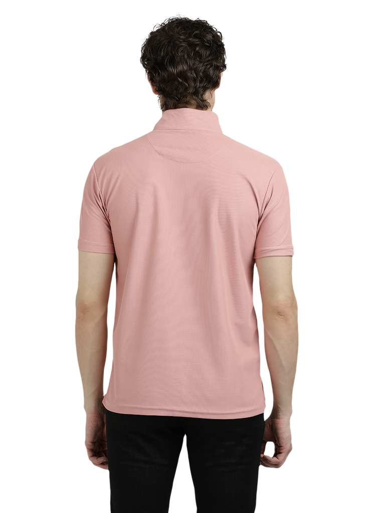 Model wearing Clarke Gable's Baby Pink Solid Turtle Neck T-Shirt in a casual setting