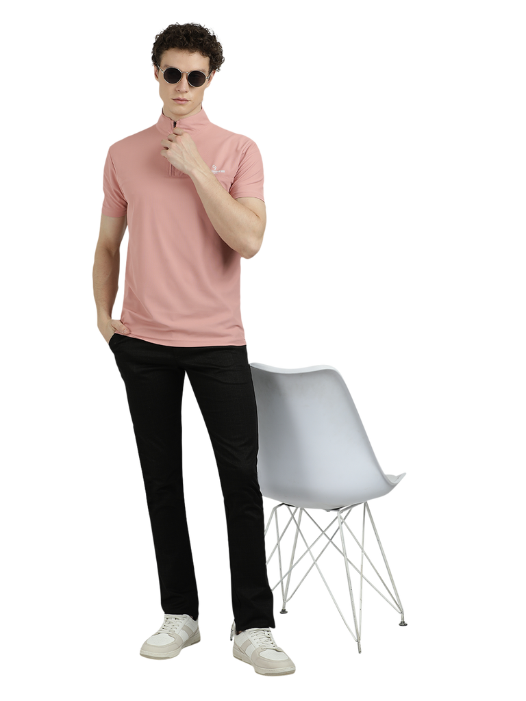 Model wearing Clarke Gable's Baby Pink Solid Turtle Neck T-Shirt in a casual setting