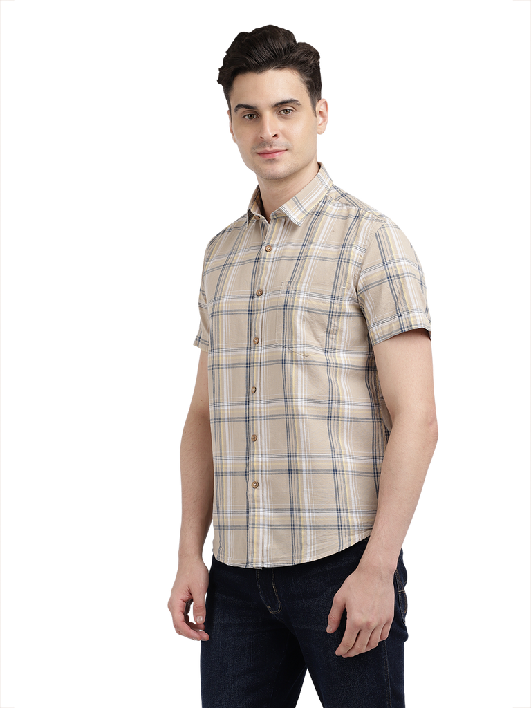 Model wearing Clarke Gable's Beige Checked Casual Shirt in a casual setting