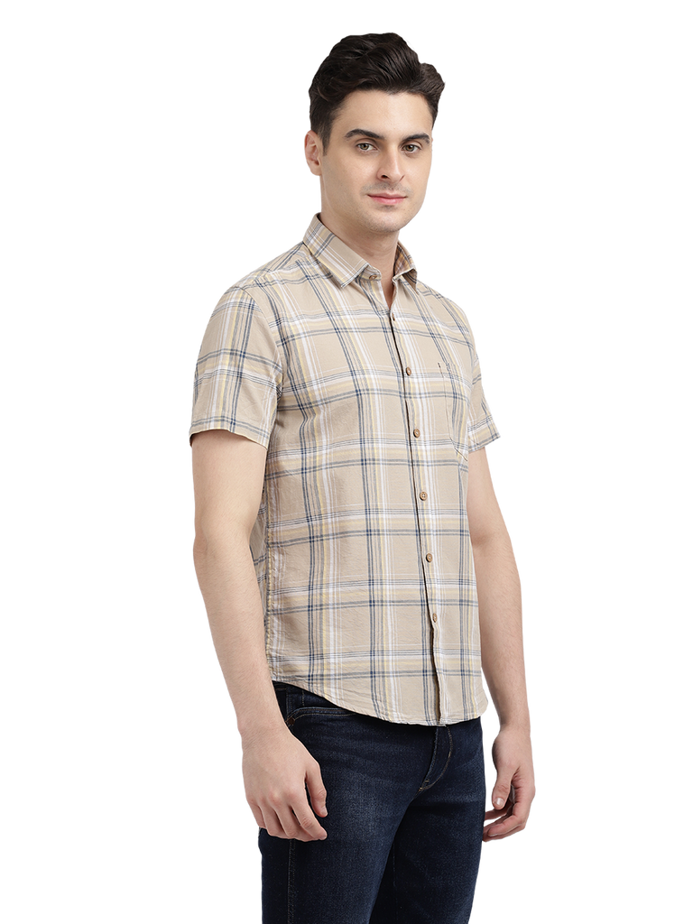 Model wearing Clarke Gable's Beige Checked Casual Shirt in a casual setting