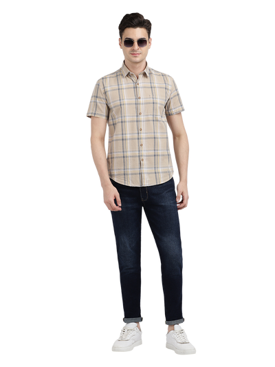 Model wearing Clarke Gable's Beige Checked Casual Shirt in a casual setting