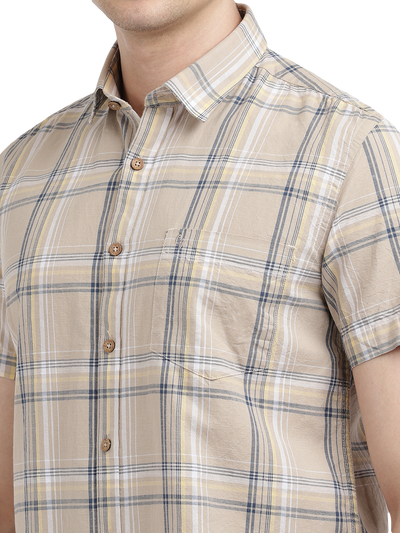 Model wearing Clarke Gable's Beige Checked Casual Shirt in a casual setting