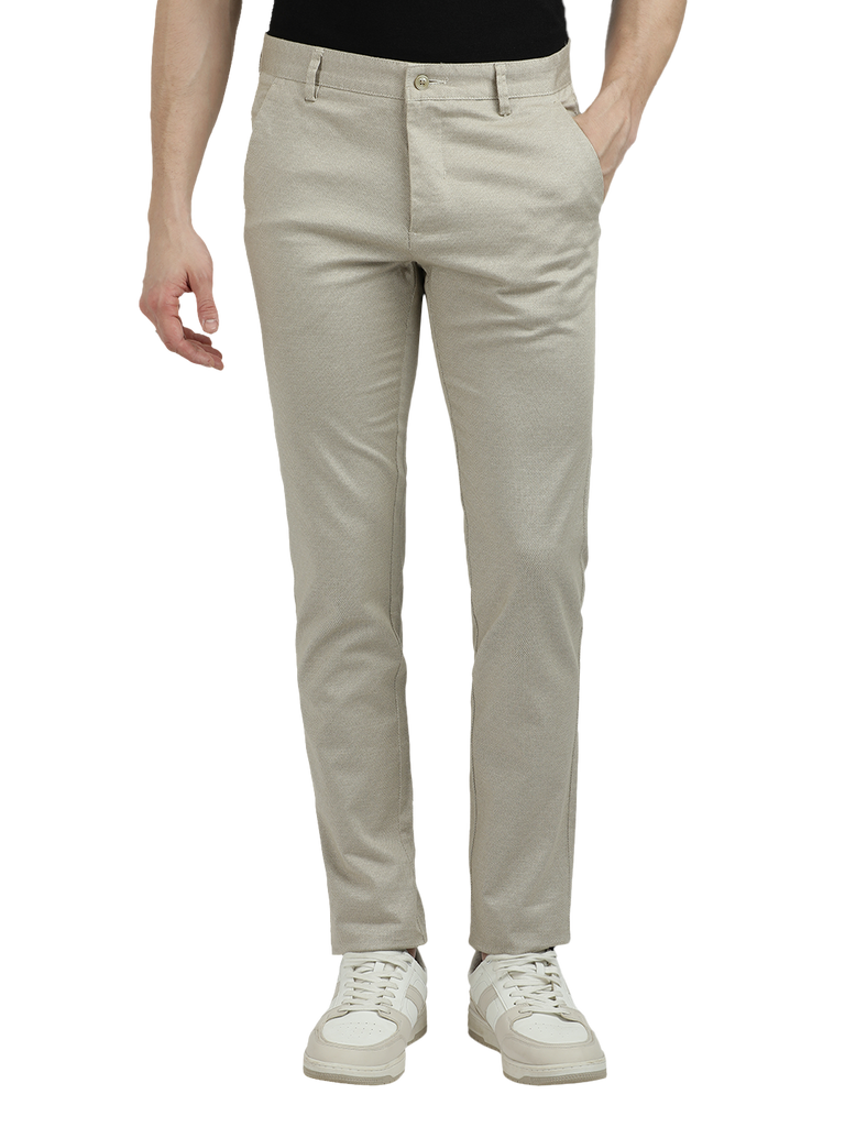 Model wearing Clarke Gable's Beige Custom Fit Trousers in a casual setting