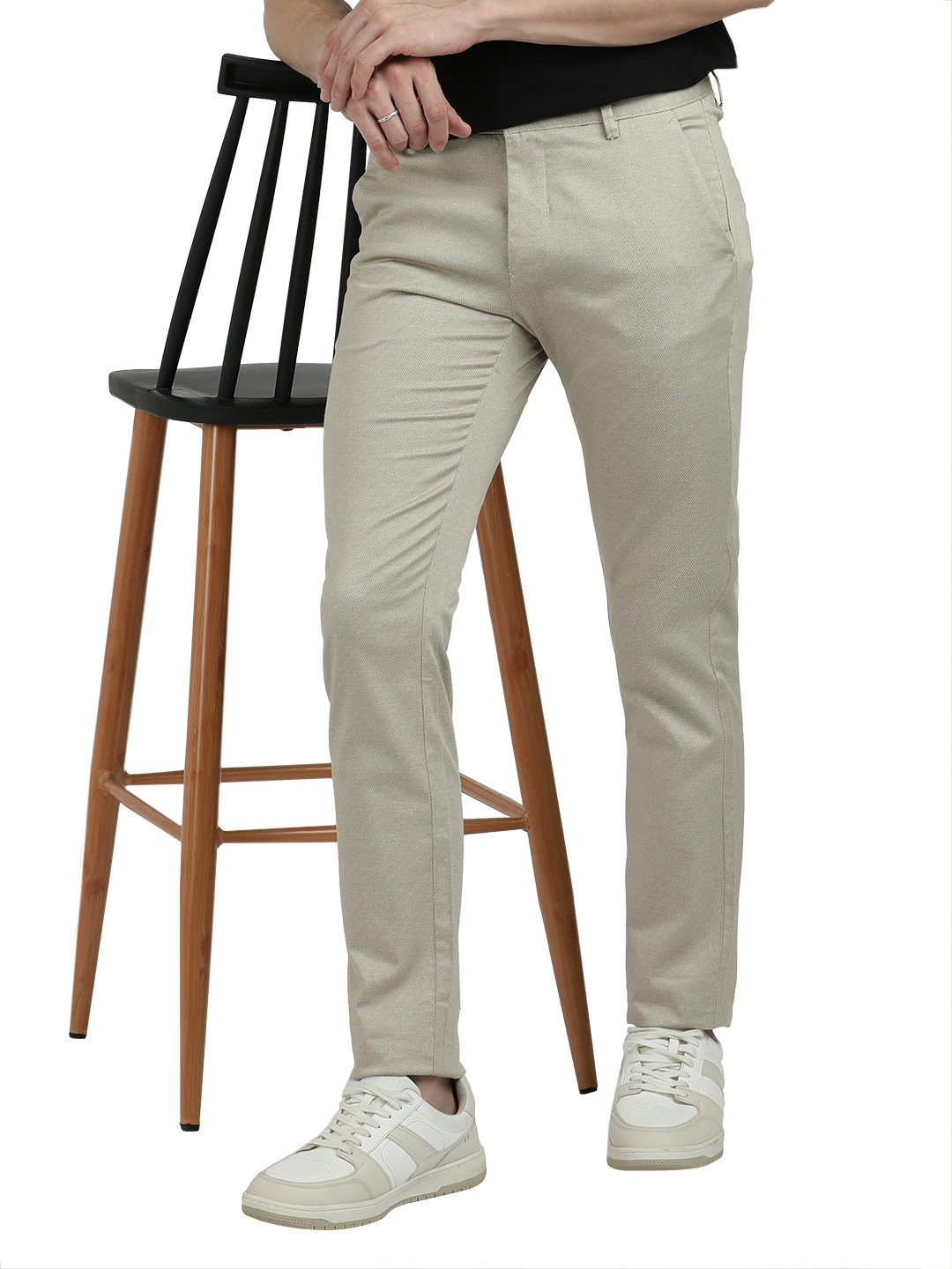 Model wearing Clarke Gable's Beige Custom Fit Trousers in a casual setting