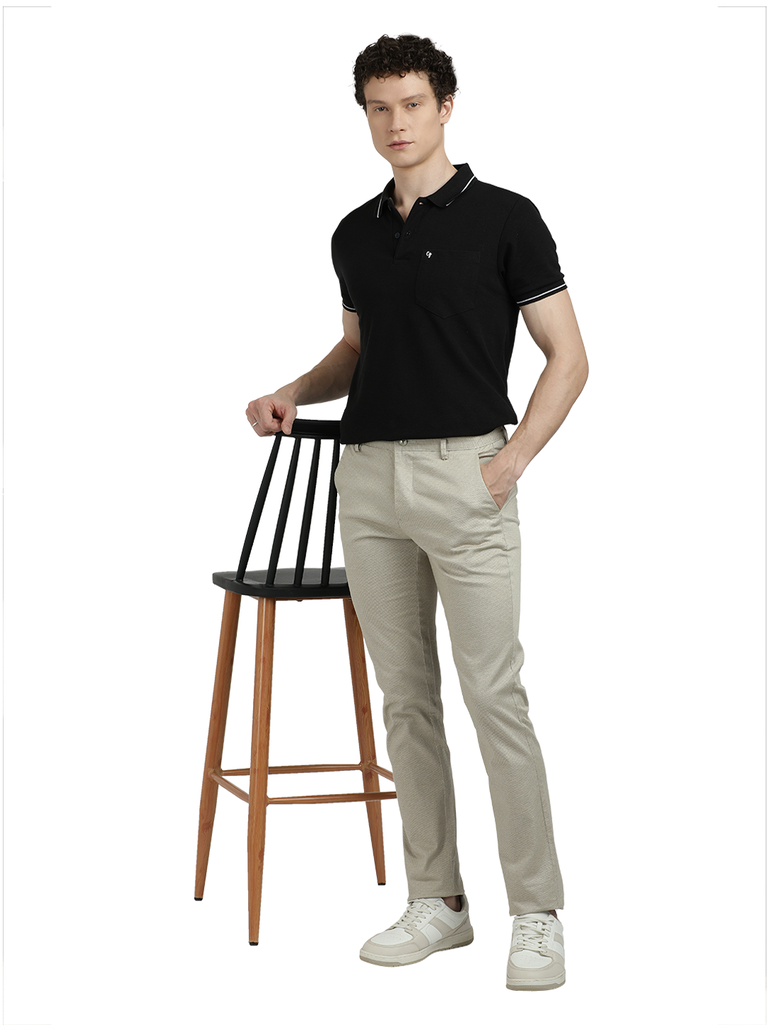 Model wearing Clarke Gable's Beige Custom Fit Trousers in a casual setting
