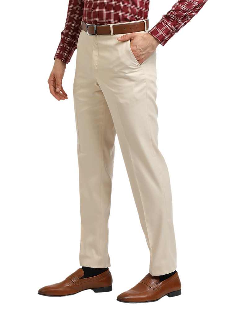 Model wearing Clarke Gable's Beige Sharp Fit Trousers in a casual setting