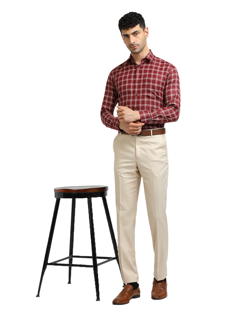 Model wearing Clarke Gable's Beige Sharp Fit Trousers in a casual setting