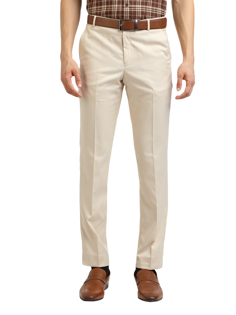 Model wearing Clarke Gable's Beige Smart Fit Trousers in a casual setting