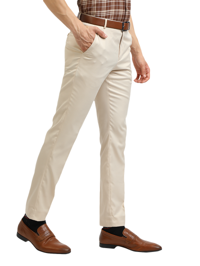 Model wearing Clarke Gable's Beige Smart Fit Trousers in a casual setting