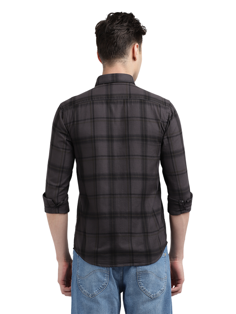 Model wearing Clarke Gable's Black Checked Casual Shirt in a casual setting