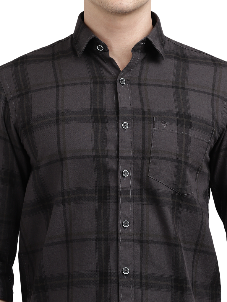 Model wearing Clarke Gable's Black Checked Casual Shirt in a casual setting