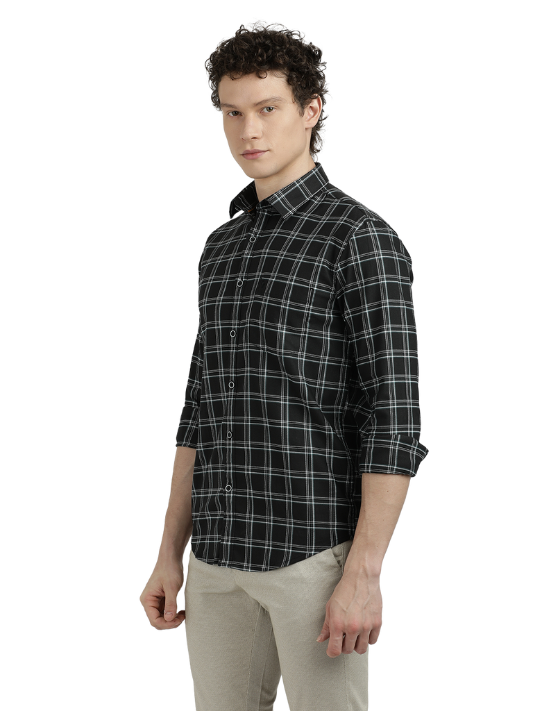 Model wearing Clarke Gable's Black Checked Semi Casual Shirt in a casual setting