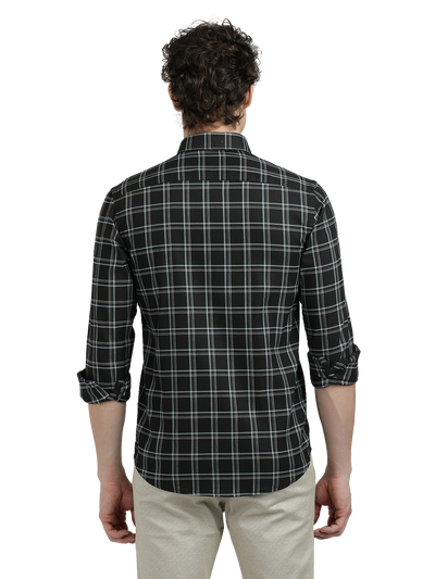 Model wearing Clarke Gable's Black Checked Semi Casual Shirt in a casual setting