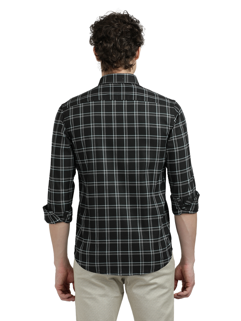 Model wearing Clarke Gable's Black Checked Semi Casual Shirt in a casual setting