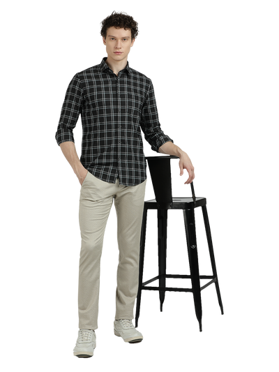 Model wearing Clarke Gable's Black Checked Semi Casual Shirt in a casual setting
