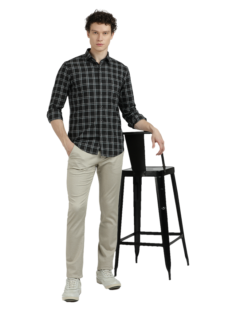 Model wearing Clarke Gable's Black Checked Semi Casual Shirt in a casual setting