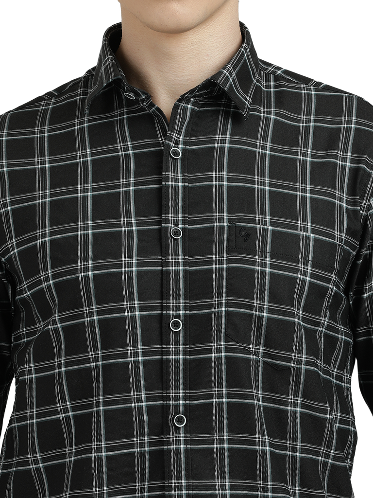 Model wearing Clarke Gable's Black Checked Semi Casual Shirt in a casual setting