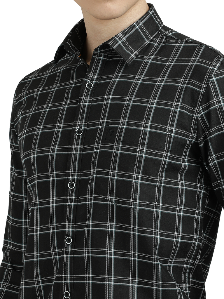 Model wearing Clarke Gable's Black Checked Semi Casual Shirt in a casual setting