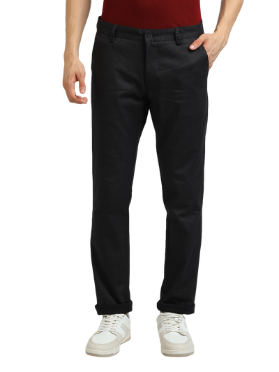 Model wearing Clarke Gable's Black Custom Fit Trousers in a casual setting