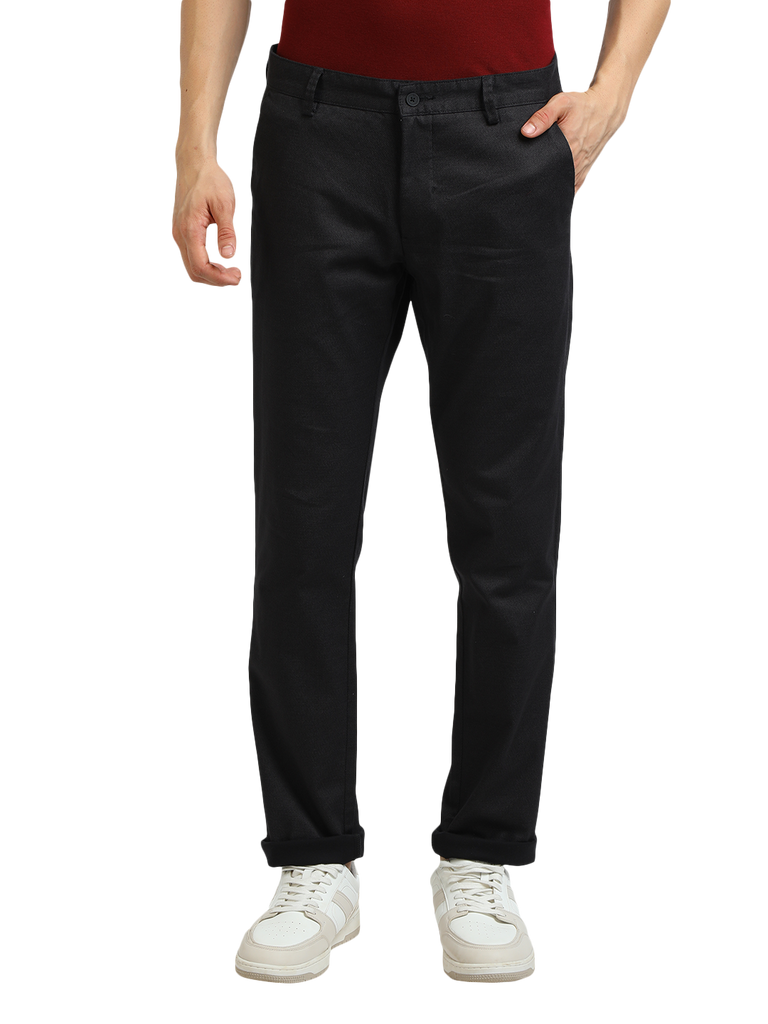 Model wearing Clarke Gable's Black Custom Fit Trousers in a casual setting