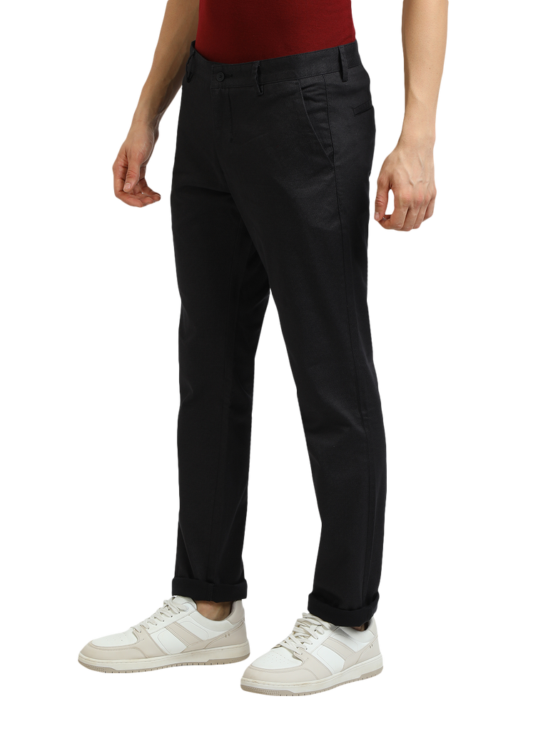 Model wearing Clarke Gable's Black Custom Fit Trousers in a casual setting